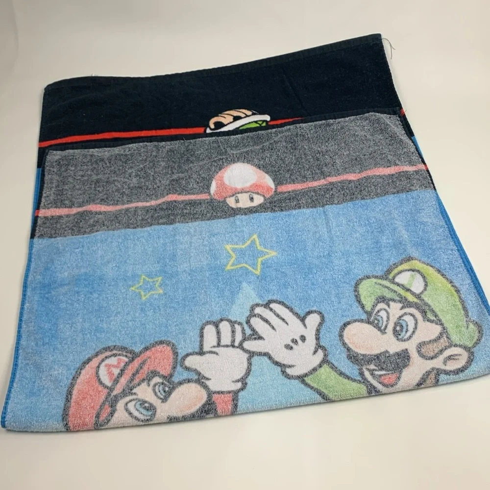 Nintendo Super Mario Bros colorful Blue Beach Towel Video game towel 27x52”